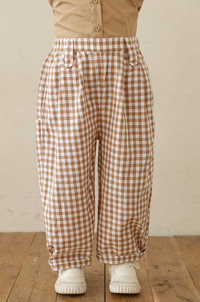 Lightweight breathable gingham trousers for girls featuring classic pleats
