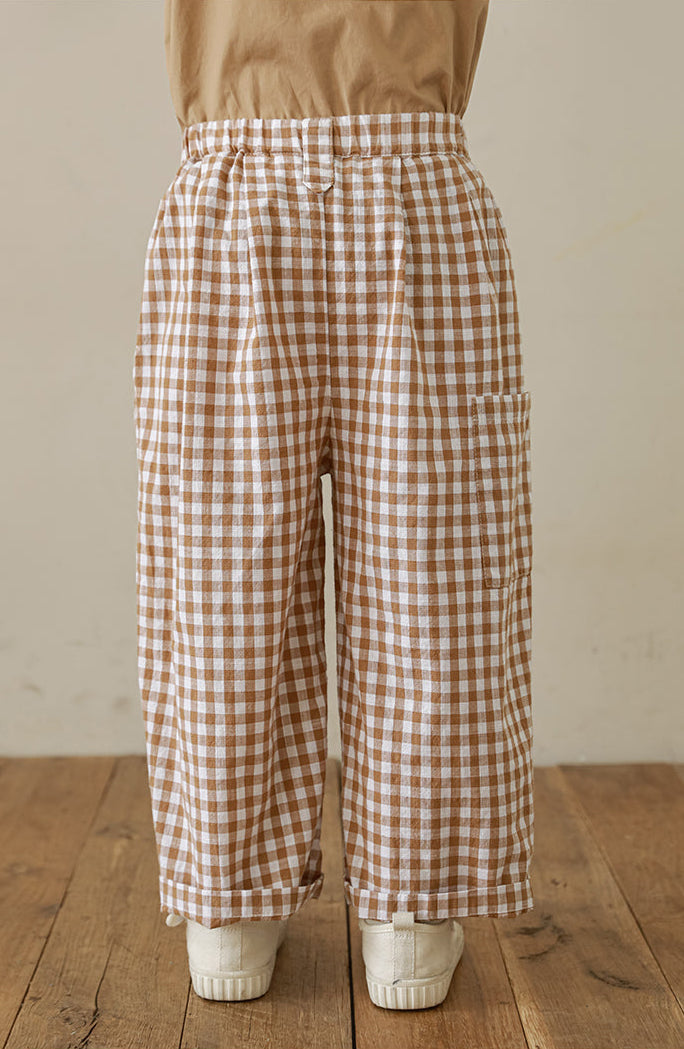 Back view of Stylish girls’ gingham trousers in soft cotton with pleat detailing