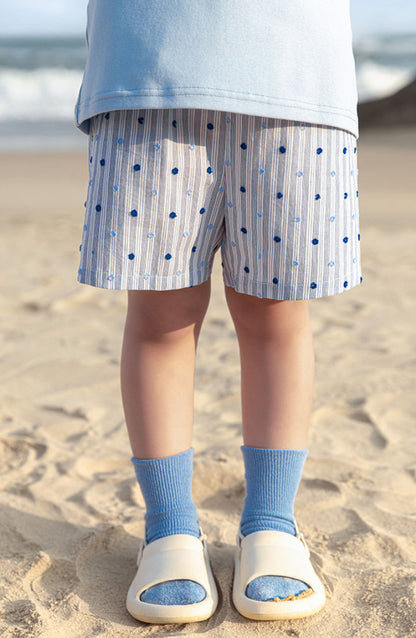 Kids summer shorts in soft blue cotton – striped and dotted design by Ava & Bear London