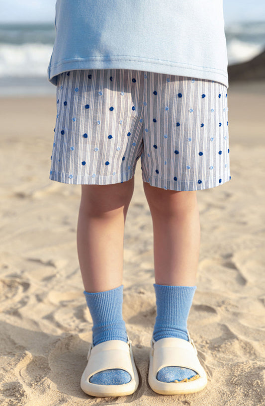 Kids summer shorts in soft blue cotton – striped and dotted design by Ava & Bear London